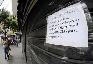 Un commerce d'électroménager à Caracas : "Chère clientèle, nous ajustons nos prix (A LA BAISSE) et nous rouvrirons lundi. Merci de votre compréhension.